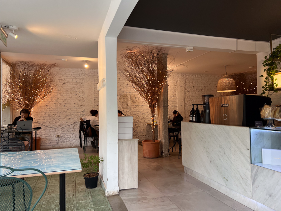 Inside cafe with soft lighting and tables